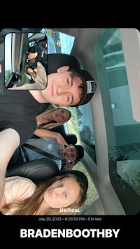 a group of people in a car with the text bradenboothby